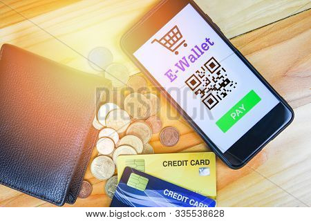E Wallet App On Smartphone With Credit Card And Coin In Wallet Technology Pay / Mobile Payment Onlin