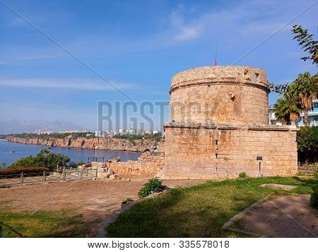 Ruins Of Ancient Hidirlik Tower In Antalya City, Turkey
