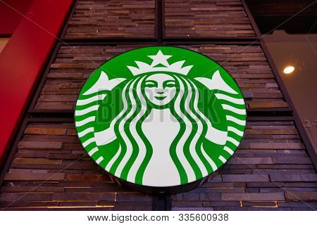 SHENZHEN, CHINA - CIRCA NOVEMBER, 2019: close up shot of Starbucks Siren sign at Wongtee Plaza shopping mall in Shenzhen