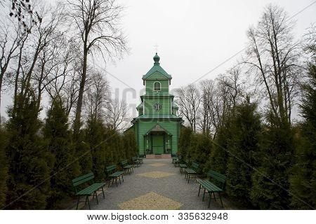 Beautiful Old Historic Historical Wooden Church On A Gray Autumn November Day, Poland