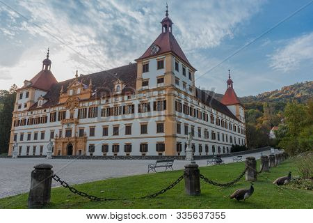 Graz, Austria - October 14, 2019:  Eggenberg Palace And Colorful Autumn Colors In The Park