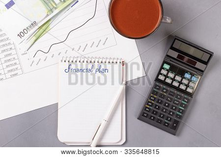 Desktop With Business Charts, Calculator And Money. 52-week Savings Plan. Financial Planner.