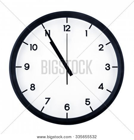 Classic analog clock pointing at ten fifty five, isolated on white background.