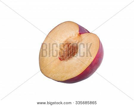Half Of A Smooth-skinned, Mellow, Purple Plum Fruit With Kernel Isolated On White Background With Co
