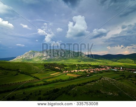 Coltesti Fortress tower and Piatra Secuiului in the background, Trascau Mountains, Transylvania, Romania