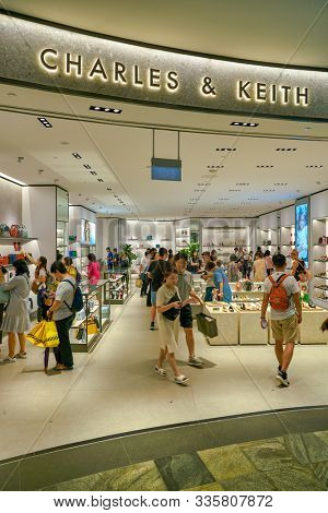 SINGAPORE - CIRCA APRIL, 2019: Charles & Keith sign over store entrance in The Shoppes at Marina Bay Sands. CHARLES & KEITH is a Singaporean fast-fashion footwear and accessories retailer.