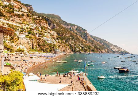 Positano, Italy - September 05, 2019: Amazing Positano Cityscape On Rocky Landscape, People On The B