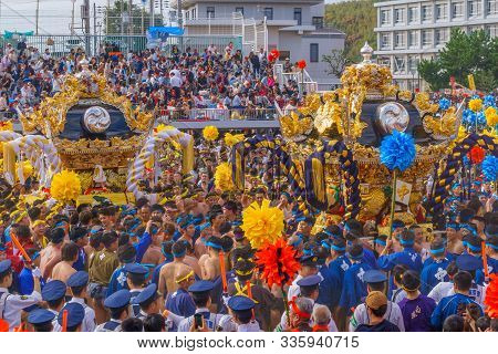 Himeji, Japan - October 14, 2019: Portable Shrine Carried By Men In Traditional Dressing, And Crowd.
