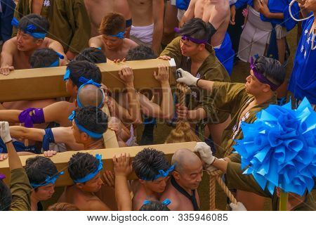Himeji, Japan - October 14, 2019: Portable Shrine Carried By Men In Traditional Dressing, And Crowd.