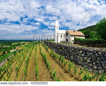 Hungary drone panorama photo of church. Somlo, wine region.