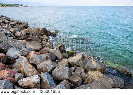 Seascape With Huge Granite Boulders On The Black Sea Coast. Coast In Blocks Of Granite