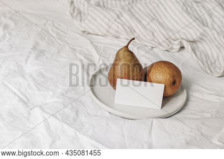 Autumn, Summer Breakfast In Bed Composition. Blank Business Card Mockup And Pear Fruit On Ceramic Pl