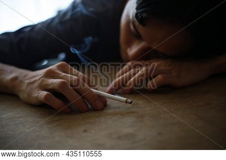 A Man Who Falls Asleep With A Cigarette