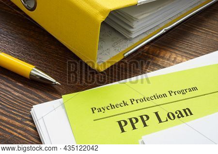 Paycheck Protection Program Or Ppp Loan Papers And Yellow Folder.