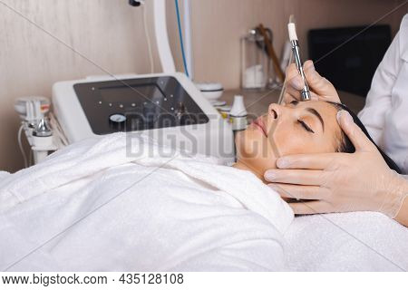 Cosmetology And Beauty Procedure At The Spa Salon. Facial Skin Treatment. Woman Waiting During Skin 