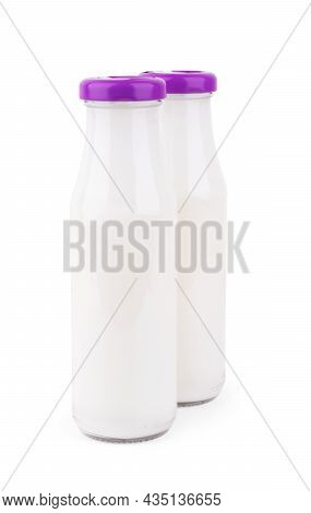 Pitcher Of Milk Isolated On White Background. Clipping Path. Glass Jug