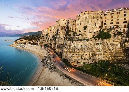 Famous historical sea resort town of Tropea in Calabria region, Southern Italy with vivid sky after the sunset