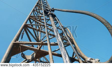 Water Well Drilling Rig, Drill Is Digging A Hole, Holes Boring In Ground With Drilling Rig Machine.