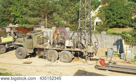 Moscow, Russia - Jule 9 2021: Water Well Drilling Rig, Drill Is Digging A Hole, Holes Boring In Grou