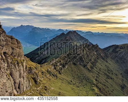 View From The Speer Mountain Peak In The Toggenburch Towards Federispitz And The Glarus Alps. Sunset
