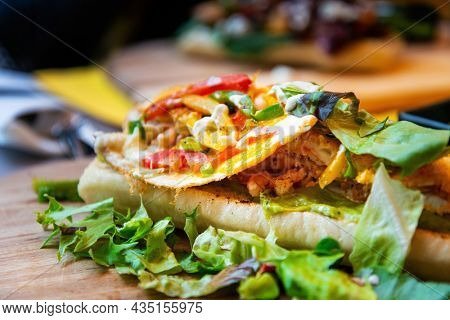 Whole-meal bread sandwich topped with Lyon rosette and butter