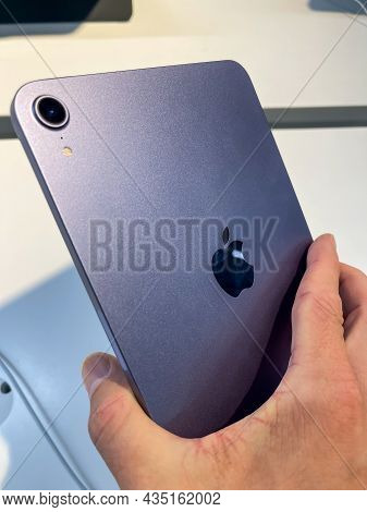 Cologne, Germany - September 30th 2021: A German Photographer Visiting An Apple Store, Comparing Tth