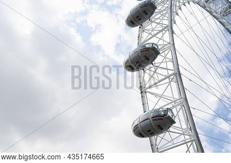 London - Aug 22,2021: The London Eye, Tourist Attraction In London City, Fair Spining Huge Wheel Con