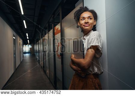 Smiling Woman Is Having Break After Meeting