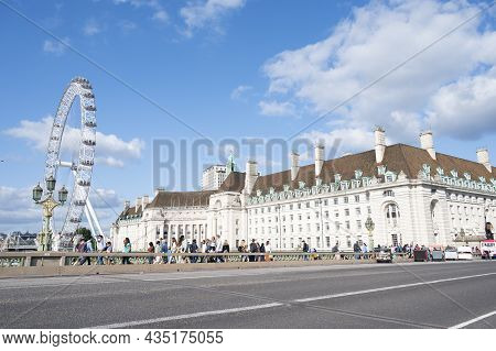 London - Aug 22,2021: The London Eye, Tourist Attraction In London City, Fair Spining Huge Wheel Con