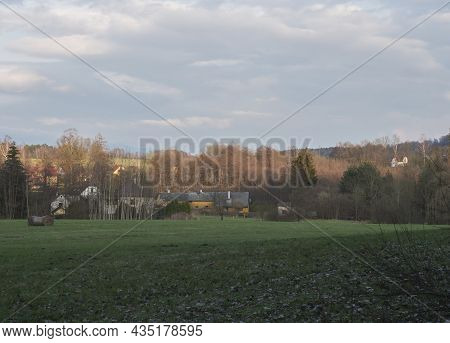 View On Village Kunratice U Cvikova In Lusitian Mountains With Old Cottages And Houses, Lush Green G