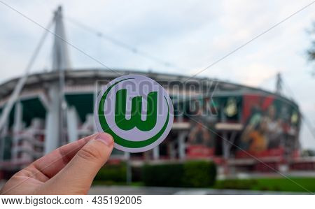 August 30, 2021 Wolfsburg, Germany. The Emblem Of The Football Club Vfl Wolfsburg Against The Backgr