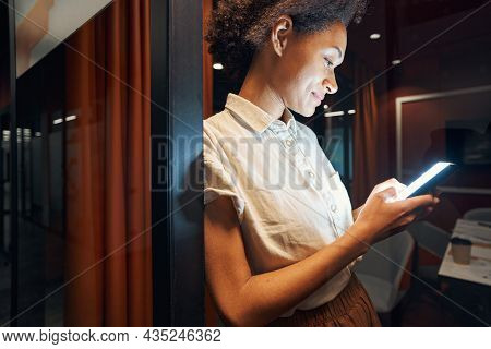 Female Person Having Break In Evening In Office
