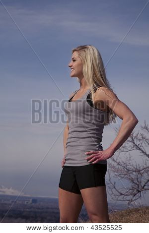 Woman Gray Tank Top Stand Outside Hands Hips