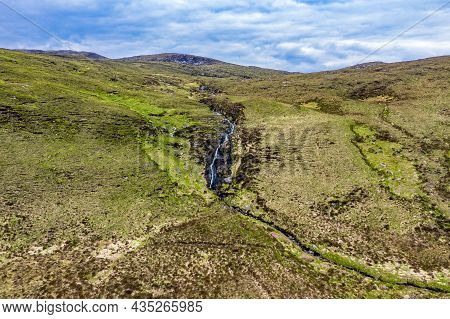 Aerial View Of A Waterfall In The Mountains Near Crolly In County Donegal - Ireland