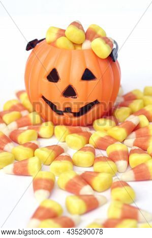 Mini Jack-o-lantern With Traditional Halloween Candy Corn