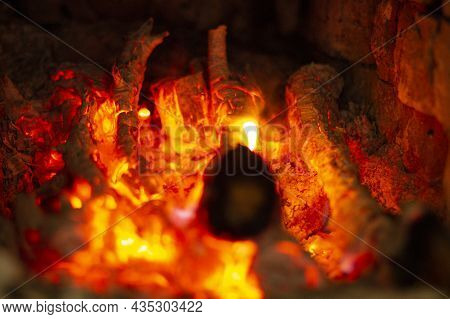 Red-hot Firebox Of A Furnace Or Forge Close-up, Selective Focus.