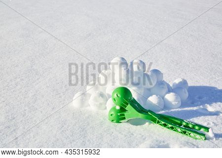 A Children Toy Is A Tool For Modeling Snowballs From Snow. Green