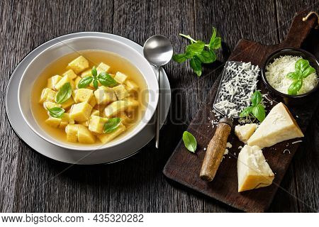 Zuppa Royale Alla Bolognese Con Brodo, Italian Soup Of Chicken Broth With Parmesan Egg Dumplings Spr
