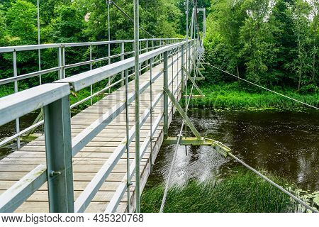 New Suspension Bridge Made Of Wood And Steel Over The Small River