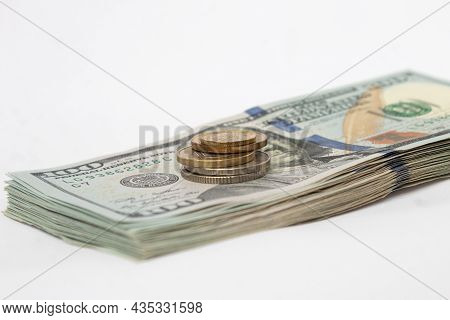 A Stack Of Hundred-dollar Bills On A White Isolated Background. 100 Dollar Bills