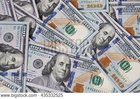 Background Of Hundred-dollar Bills. The Texture Of Hundred-dollar Bills. A Lot Of Dollars