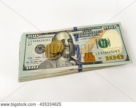 A Stack Of Hundred-dollar Bills On A White Isolated Background. 100 Dollar Bills
