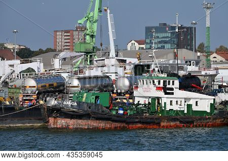 Klaipeda, Lithuania - October 02: Boats And Cranes At Klaipeda Sea Port At October 02, 2021 In Klaip