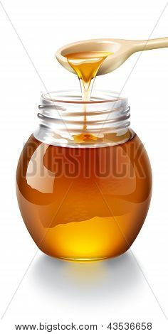 Honey with wooden spoon