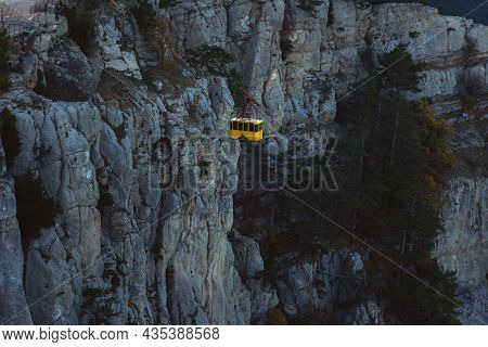 Yalta Crimea October 13, 2019. Cable Car To The Upper Building Of Ai-petri At Dusk. The Teeth Of Ai-