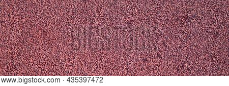 Closeup Of Red Rubber Floor Covering For Playground