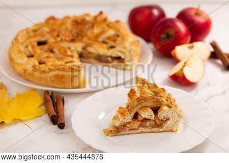 Autumn Apple Pie And A Slice Of Pie. Apple Pie, Cinnamon, Apples And Autumn Leaves
