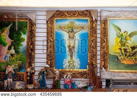 Buga, Colombia - October 2021. Sale Of Religious Articles Close To The Minor Basilica Of The Lord Of