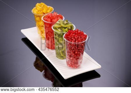 Watermelon , Pineapple  , Pomegrenate And Kiwi