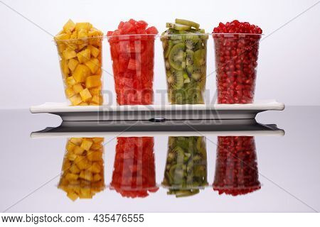 Watermelon , Pineapple  , Pomegrenate And Kiwi